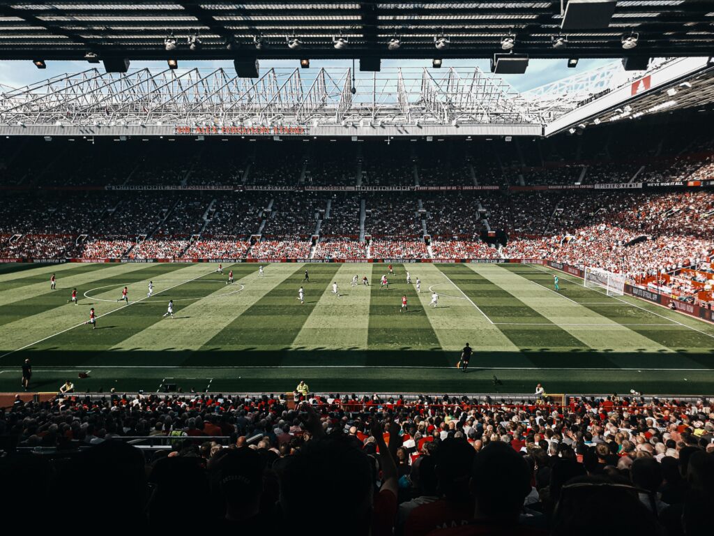 Watching a game at Old Trafford, the home of Manchester United